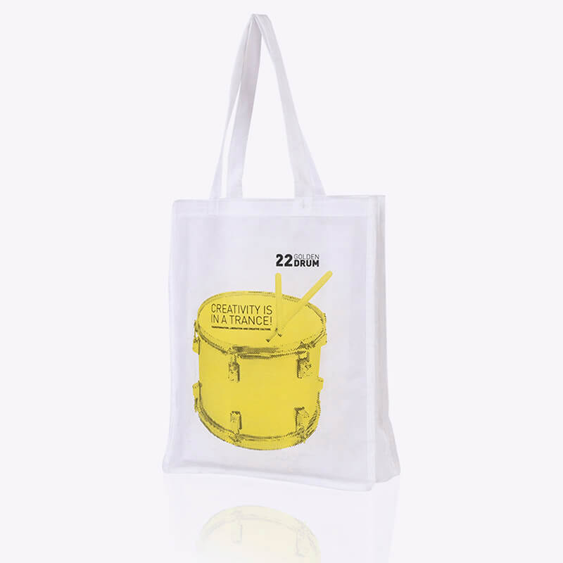 White non-woven bag with yellow drum image on it