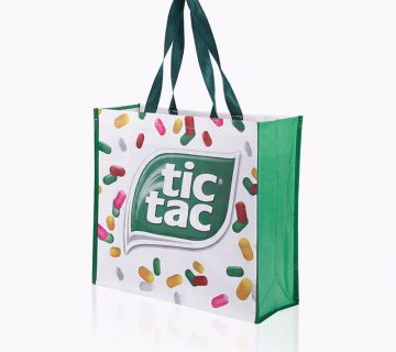 Full colour printed glossy pp-woven with green handle tote bag that says tic tac