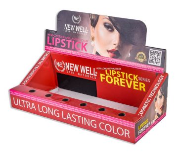 Carboard counter display for lipstick with woman image on it
