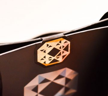 Hot foil sticker used as paper bag closure