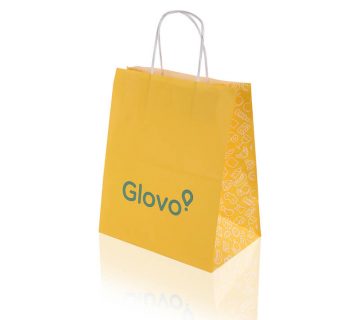 Twisted handle yellow kraft paper bag that says Glovo
