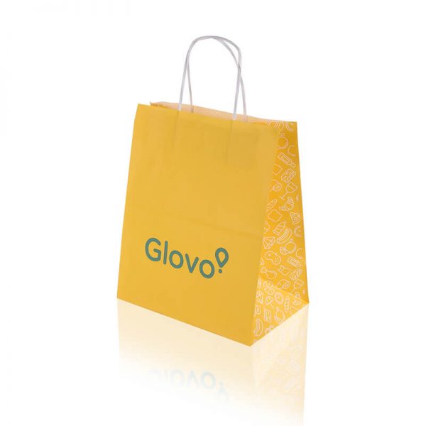 Twisted handle yellow kraft paper bag that says Glovo