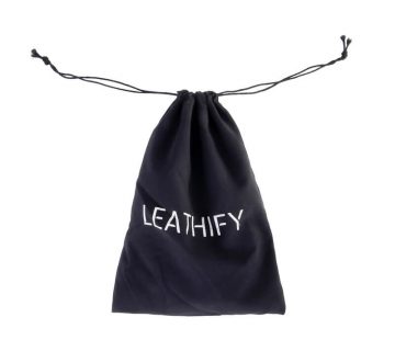 White logo printed black cotton drawstring pouch that says laeathify
