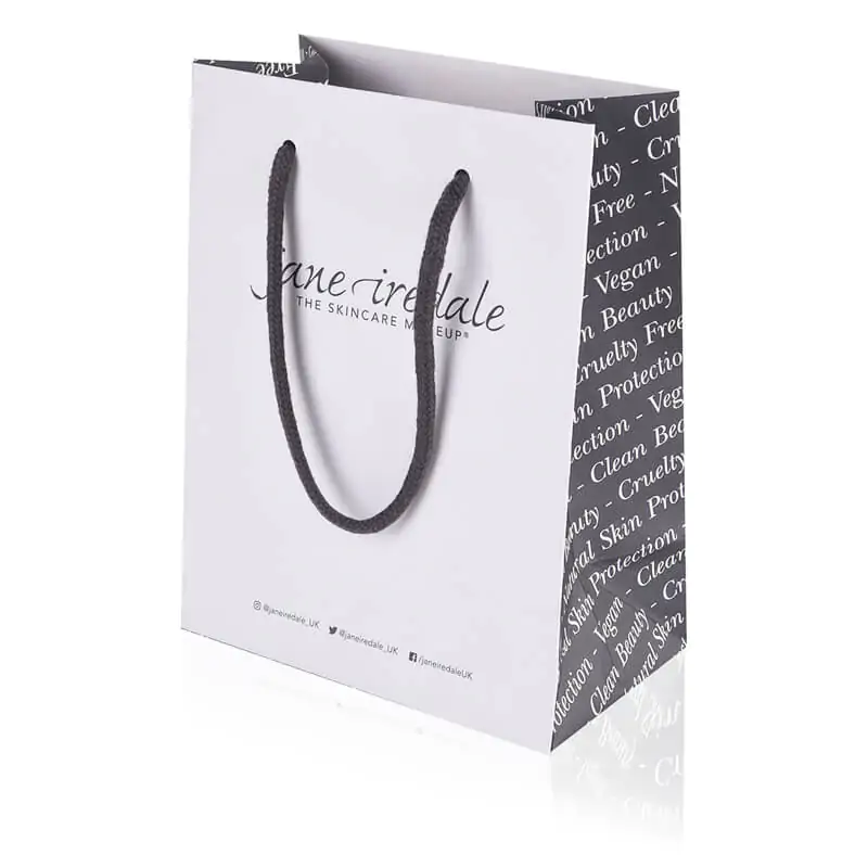 white kraft uncoated luxury paper bag with cotton handle that says jane iredale