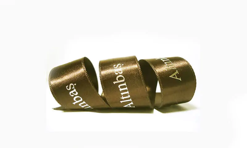 Logo printed satin ribbon that says altinbas