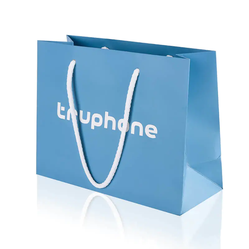 Matt laminated blue luxury paper carrier that says truphone