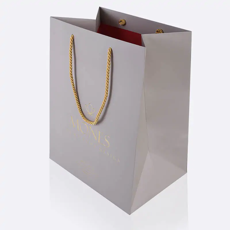 Super luxury red insight paper bag with gold cord handle, gold hot foil, embossing