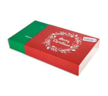 Red paperboard sleeve on green box that says merry christmas