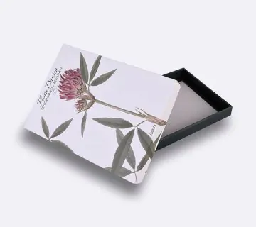 Base and lid corrugated textile box with flower image on it